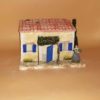 Maison volets bleus avec cyprés